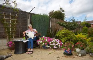 Lady outside with cat